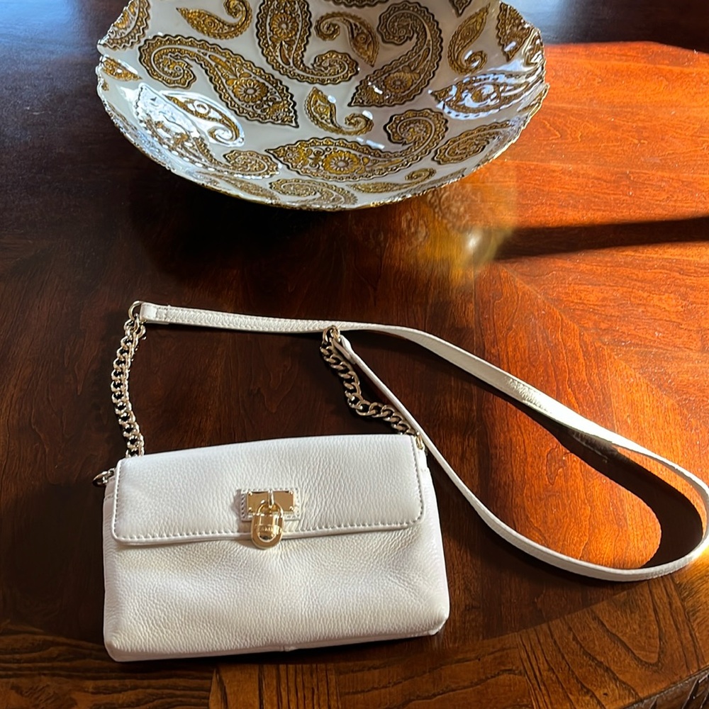 NWOT Calvin Klein leather Crossbody Cream heavy lock. 5 pockets.
